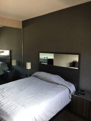 Queen Sized Beds and Floor to Ceiling Mirrors in Every Room