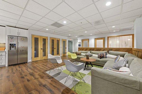 Lounge and kitchen area for behavioral health patients at Embark at Cabin John.