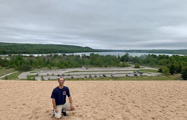 From the top of the first sand mound looking down upon the parking lot and lakeshore.