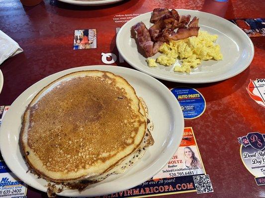 Pancakes breakfast includes two eggs (scrambled), and six pieces of bacon!