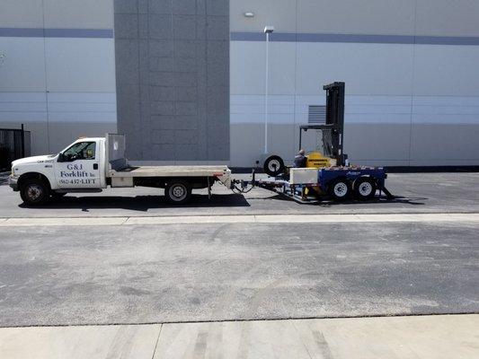 Our forklift being moved.