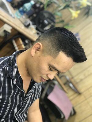 Low fade with spiky.