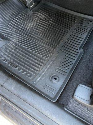 Floor mats thrown in, not fastened.