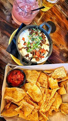 Chips and queso with carne asada