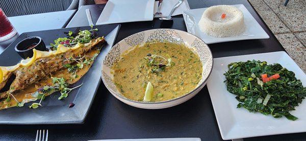 Fried fish, lentil curry, and collard greens