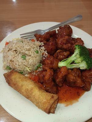 Lunch plate: Orange chicken, spring roll, fried rice and tea for $11