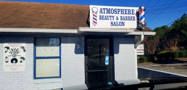 Front door of Atmosphere BarberShop.