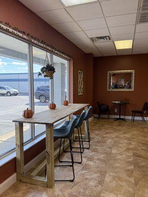 Front seating area with a nice counter table.