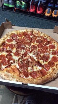 My large pizza with extra pepperoni and extra cheese for $12.30 was awesome!