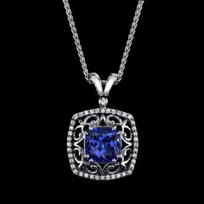 One of a kind 6.00 carat tanzanite and diamond pendant set in 14K white gold.