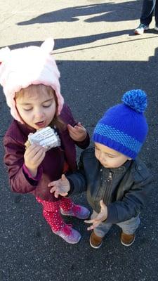 market customers enjoying a birthday cake tart