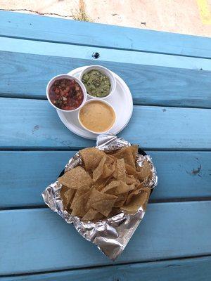 Our Stop Light. Includes Chips, Salsa, Guac and Queso.