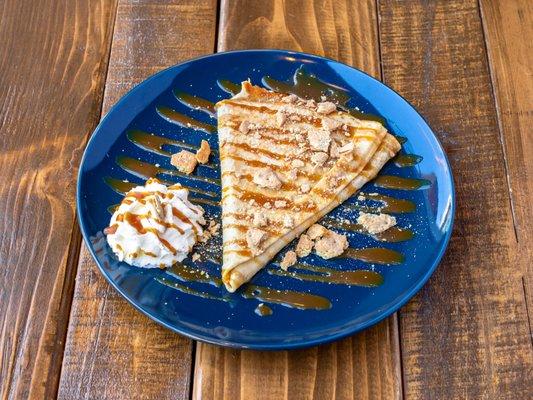 Apple Pie Crêpe with house made bourbon caramel sauce and graham cracker