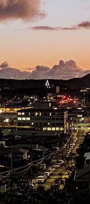 2024 sunset in Kaimuki with tree lit up!