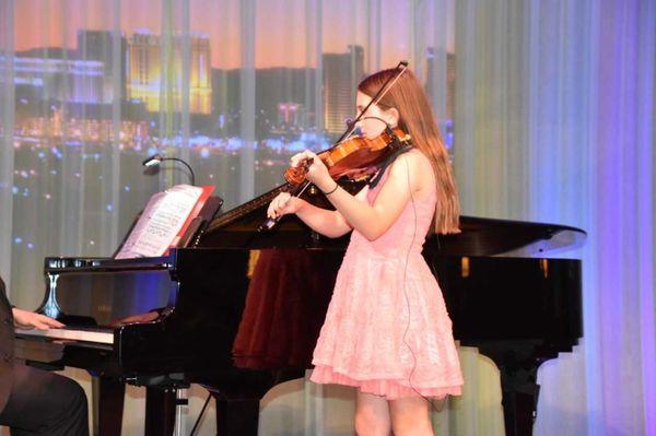 A student of our Music School in Henderson, NV, playing the Violin.