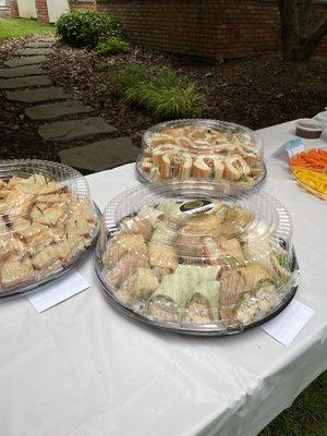 Sloppy joe platter (back left), wraps (front), veggie sandwiches (back right)