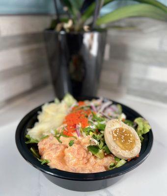 BYO Poke Bowl: 1/2 brown rice, 1/2 mixed greens, salmon x2, spicy tuna, ajitsuke tamago, spicy aioli, masago | Medium - $13.50