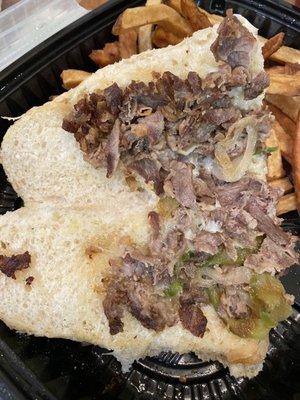 Half of a sad Philly Cheesesteak