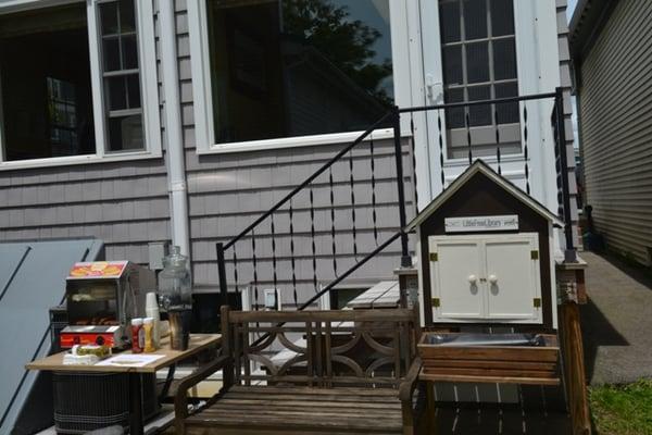 Our 'Little Free Library' on the patio behind Yankee Pedlar is joined on Saturdays in the summer by FREE "Nathan's" hot dogs.