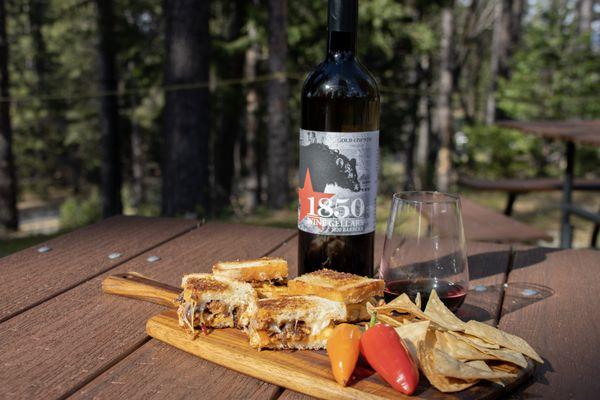 The mexi-cali grilled cheese sandwich with chorizo paired with wine!