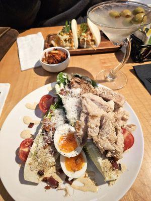 Japanese Cesar salad with fried chicken.