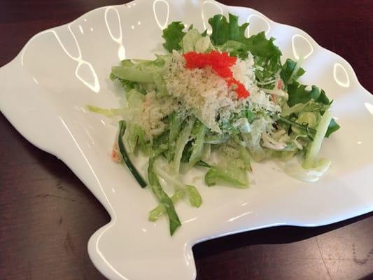 Complimentary salad from the sushi bar. Light & tasty.