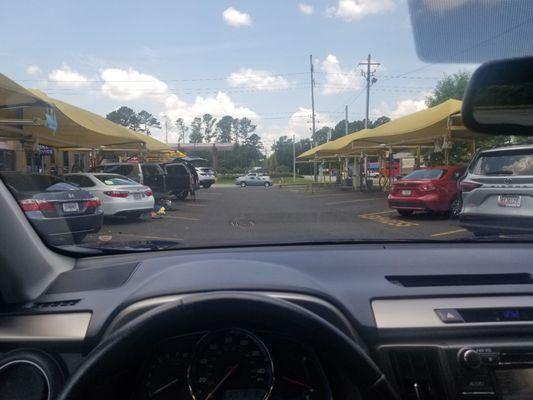 Small view of Express Carwash on Jimmy Carter. The left is the detail area. The right is the self service area.