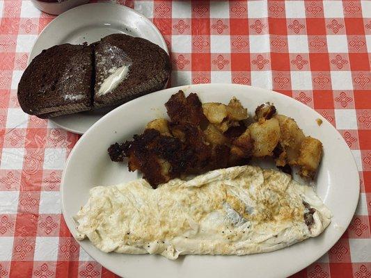 Egg white and homemade hash& cheese omelet with pumpernickel toast