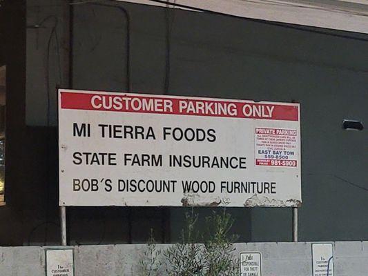 Parking lot sign at Mi Tierra Foods on 12/5/21