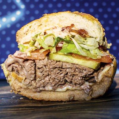 VENO
 House-made Hot Roast Beef, Bacon & Provel, Dressed with Lettuce, Tomato, Pickle, Onion & Sweet Red Pepper Sauce, Seeded French