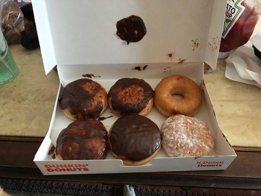 4 Boston creams, one jelly, and one that's supposed to be blueberry but is a plain glazed.