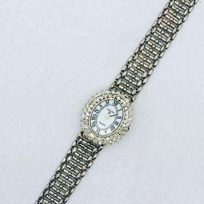 14K White Gold and Diamond watch. White porcelain dial.