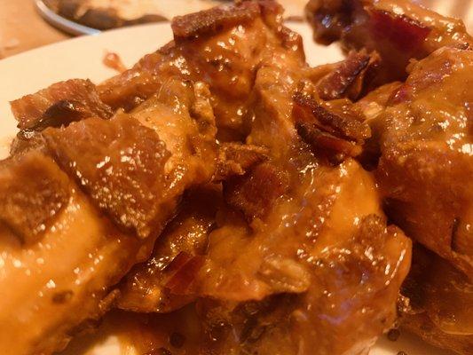 Specialty wings with peanut sauce and BACON