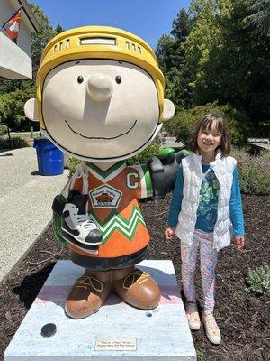 New skater with Charlie Brown statue