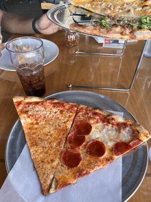 Lunch special: slice of cheese and pepperoni with a fountain soda