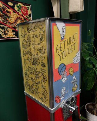 Our get what you get machine. Can't decide  on a design? Spin and get a tattoo with shading for $100, or with shading and color for $150