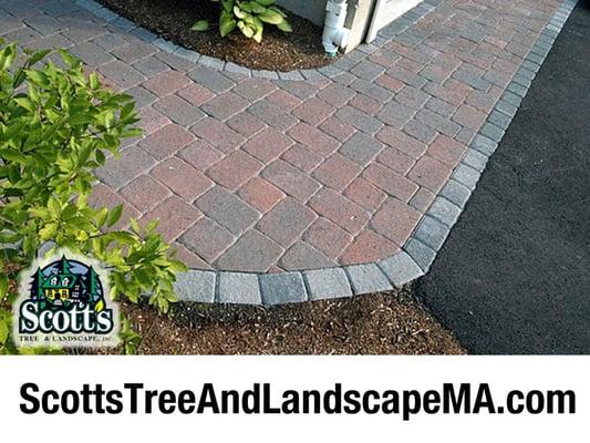 Brick pavers walkway with stone edging in Westford, MA.