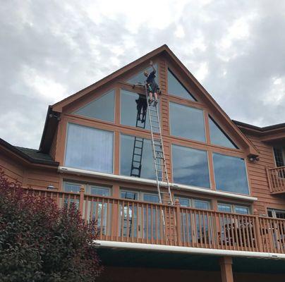 Washing windows on a three story building