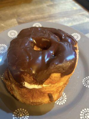 Chocolate topped cronut with cream inside. (Where has this been my whole life)