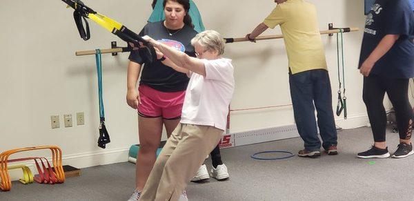 Seniors using TRX body weight training.