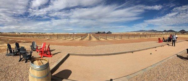 Panoramic photo of the back of the winery where it has incredible views and nice outdoor seating