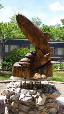 carved fish on the lawn fountain