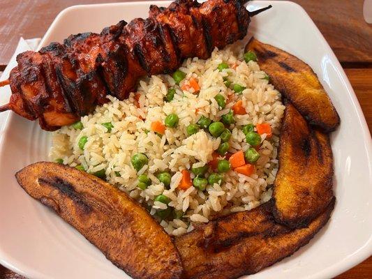 Chicken suya skewer with coconut rice and plantains