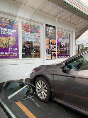 Windows with colorful ads.