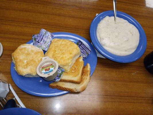 Biscuits and a bowl of sausage gravy