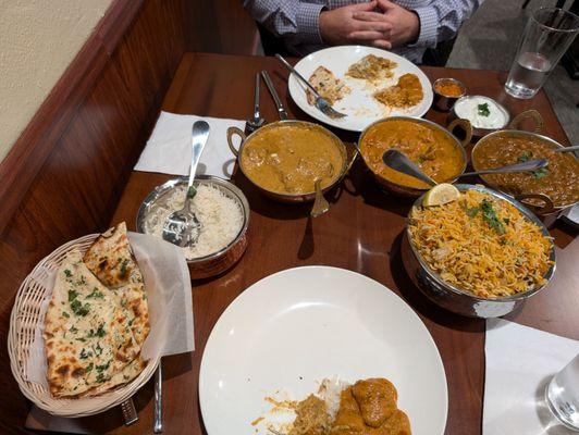 Garlic naan, lamb korma, chicken Tikka masala, chana masala, and Amaravathi eggplant biryani. All SO good!!! Rice and Raita included.