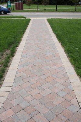 brick pavers on straight path walkway