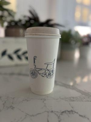 Coffee to go cup with banana seat bike