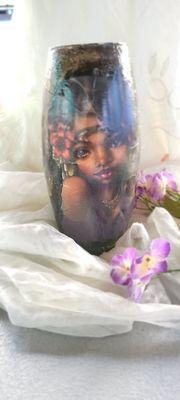 Lovely girl on Black vase traces of gold