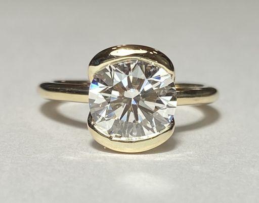 Custom half bezel engagement ring